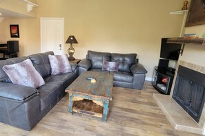 There's nothing better than after a long day coming back to this cozy living room with flat screen TV