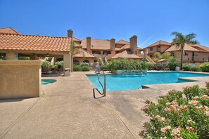 Community Heated Pool and Spa area with gas BBQ Grills