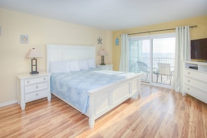 Primary Bedroom with King Size Bed, En-suite Bathroom and Balcony Access