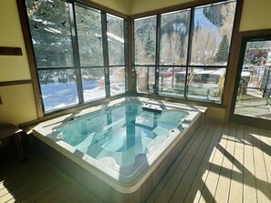 The Telluride Lodge Spa area features an indoor and outdoor 8 person hot tub for guests.  This space also features a large steam room, shower and changing room as well as restroom. open 10am-10pm