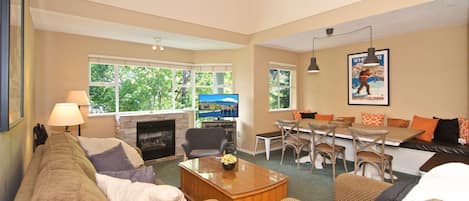 OPEN spacious plan with over-sized dining and comfortable bank-ette seating