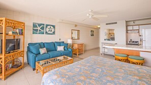 Flat screen TV, sofa bed and a ceiling fans lend more comfort and convenience