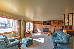 The spacious living area offers plush couches to relax in.