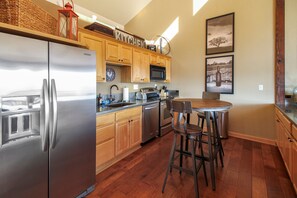 Fully Stocked Kitchen with Stainless Steel Appliances