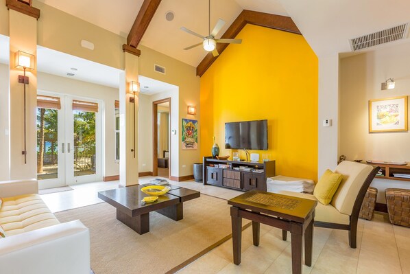 Mango Cottage's living room with a flat screen TV