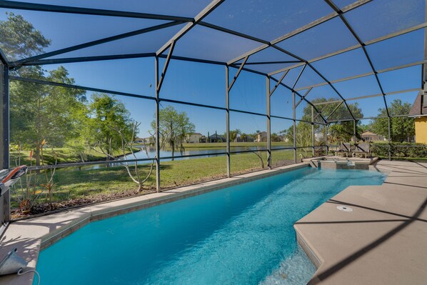 Kissimmee Vacation Rental | 4BR | 3BA | 1 Step to Enter | 2,084 Sq Ft