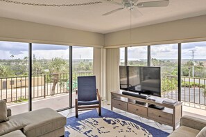 Floor-to-ceiling windows give the condo a bright and airy feel.