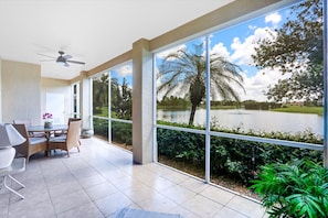 VY693-16B - The very spacious, 40 foot lanai is screened in, tiled and offers breathtaking lake views!
