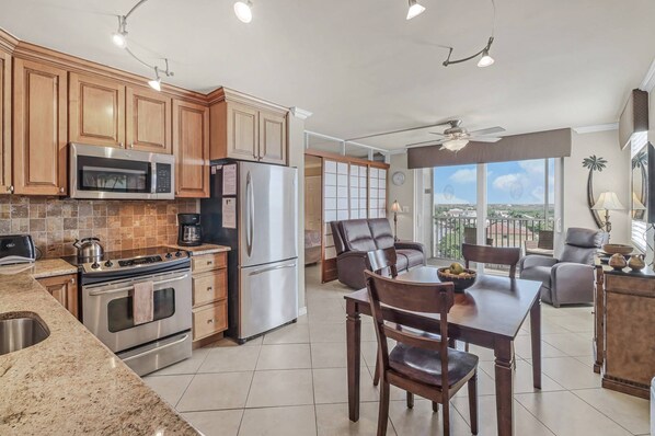 Warm and welcoming Tommy Bahama inspired decor greets you in this well appointed 8th floor condo.