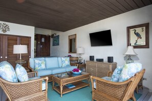 Lots of comfortable seating in living area for enjoying the view