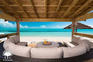 Villa Isla's beachfront lounging area.