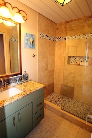 Fully renovated bathroom with large shower.