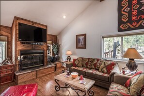 Living in Comfort - Experience the crystal-clear flat screen in the living room at DreamCatcher. There are comfortable, clean sofas with enough space for everyone to relax after a long day in the New Mexico sun.