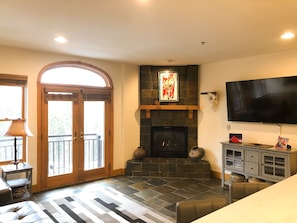 Fireplace, private balcony and TV