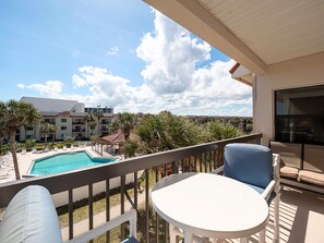 Balcony Dining with Pool + Ocean Views