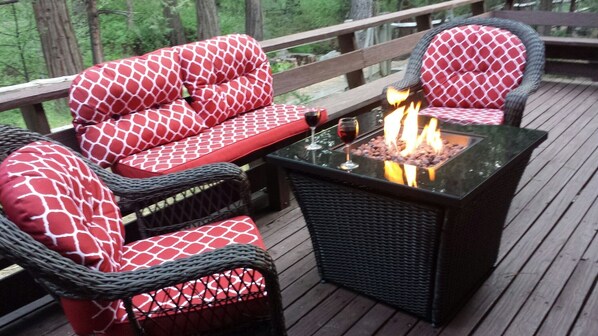 Kick back with a glass of wine. - Kick back with a glass of wine and enjoy hanging out in the pines.