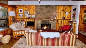 Living Room with Stone Fireplace. - Cozy up with your loved ones by this crackling fireplace...