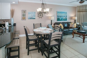 Tiled dining area with table for 4