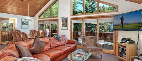 Large picture windows with mountain views from the kitchen, dining and living room.