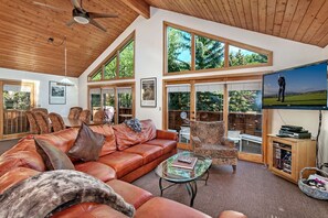 Large picture windows with mountain views from the kitchen, dining and living room.