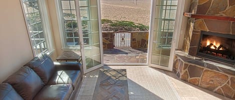 Photo showing view to the beach from the living room area