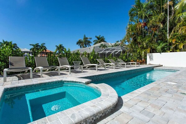 Private Pool and Hot Tub (Pool Heat Optional Add On at Time of Booking); Ample Seating; Private Grill; Privacy Fence; Southern Exposure!
