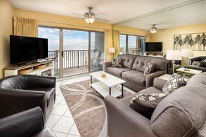 Living Room - Snuggle up for a movie or watch the majestic waves crash on the beach.