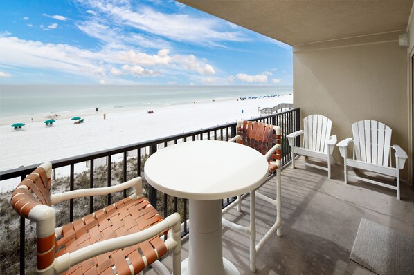 Balcony view - Large beach front balcony with entrances to the living room and master bedroom