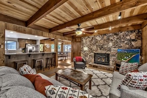 Entertain your loved ones in this living room adjacent to the dining room and kitchen (fireplace is not operable for safety. Fireplace is decorative only and not available for fires)