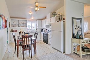 Savor your feasts at the 4-person eat-in dining table.