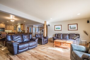 Comfy living room furniture with seating for 7 and rare in home air conditioning