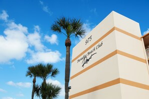 Experience beachfront luxury at Paradise Beach Club, where modern architecture meets tropical charm.
