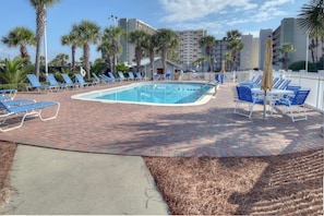 Resort Outdoor Pool for Sunbathing and Relaxing - Plenty of Lounge Chairs and Tables for your Enjoyment!