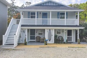 Studio Exterior | Open Parking in Gravel Area | 2 Other Vacation Rentals On-Site