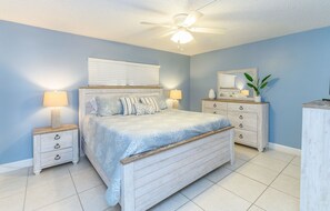 Drift into comfort in this breezy master's bedroom, where soft blues and coastal vibes set the perfect tone.