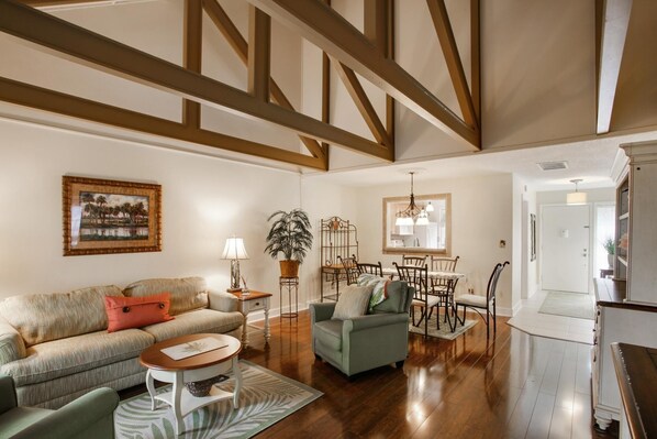 Open and Airy Living & Dining Rooms with Cathedral Ceilings