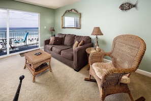Living Room View - While here, take a moment to relax in front of the gorgeous living room view. Open the balcony door to invite in the sounds of the beach!