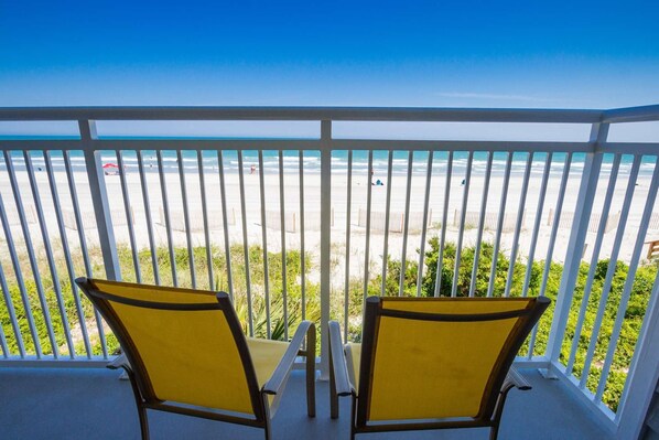 A perfect view of the beach and ocean from the first floor balcony.