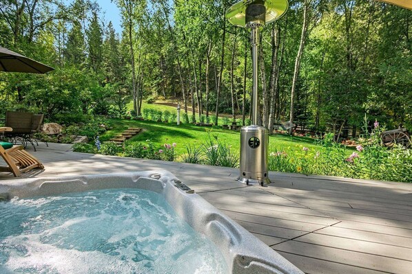 Relax in the sunken hot tub after a day of hiking, biking or skiing.