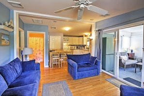 The living area offers plenty of plush seating for your whole group.