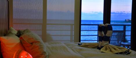 Master Bedroom with Balcony Overlooking Pool, Beach and Ocean