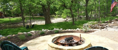 Custom fire pit overlooking the Cypress Creek