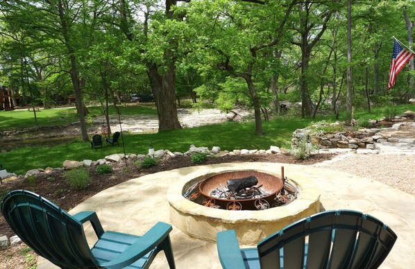 Custom fire pit overlooking the Cypress Creek