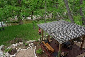 Creek and pergola views from the upper deck.