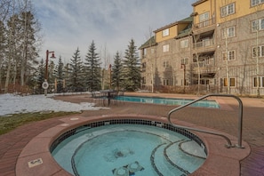 Relaxing Hot Tub Next To Heated Pool