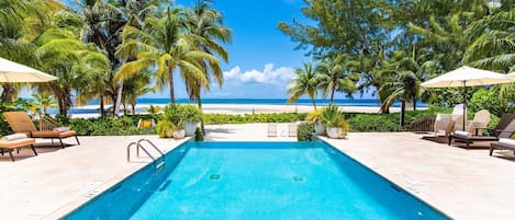 Pool and private beachfront.