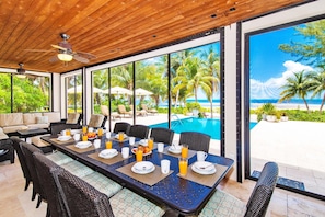 Dining with a view on the screened porch.