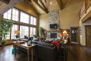 Living room with large south facing windows.