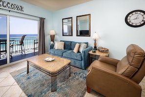 Check out the views from Pelican Isle 602 - This 6th floor beach front living room has a sleeper sofa, recliner and a large  flat screen TV with TV stand. The view is Beautiful!
