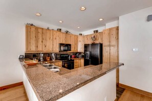 Large, Open Kitchen, Ample Storage, Fully-Equipped and Shiny Clean